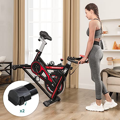 SONGMICS Bicicleta spinning, Bicicleta estática, para fitness en casa, con manillar ajustable, asiento y resistencia, sensor de pulso, pedales enjaulados, Negro y Rojo SEB617R01
