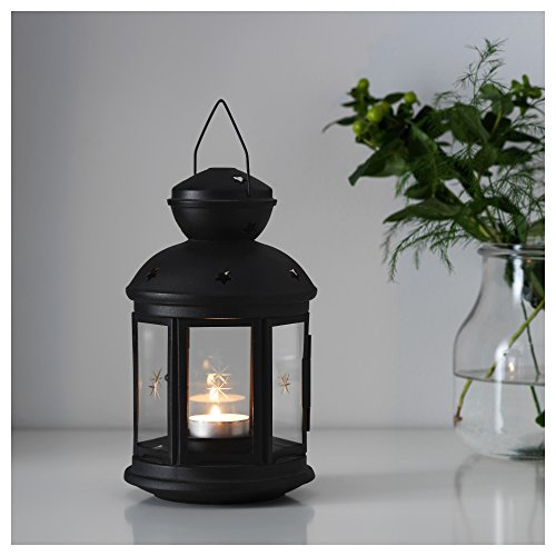 Farol para velas de color negro, apto para uso en interiores y al aire libre, de la marca Ikea Rotera